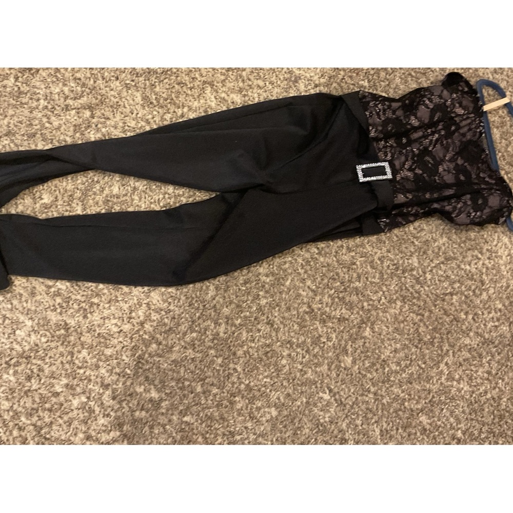 Old dance costume pink jacket and black jumpsuit